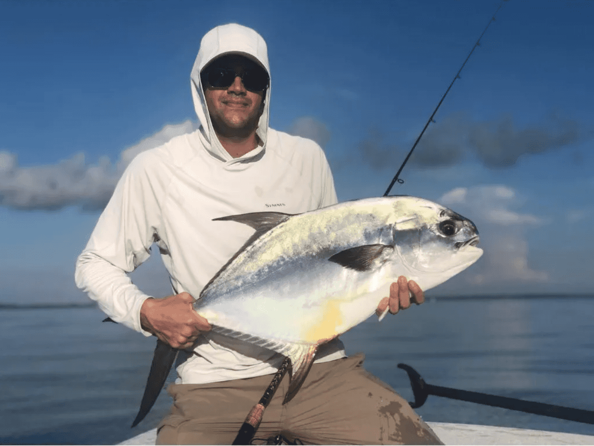 Captain Jason Fernandes with a Permit