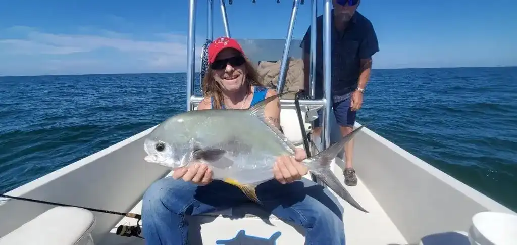 Captain Hank Valencia with a Permit