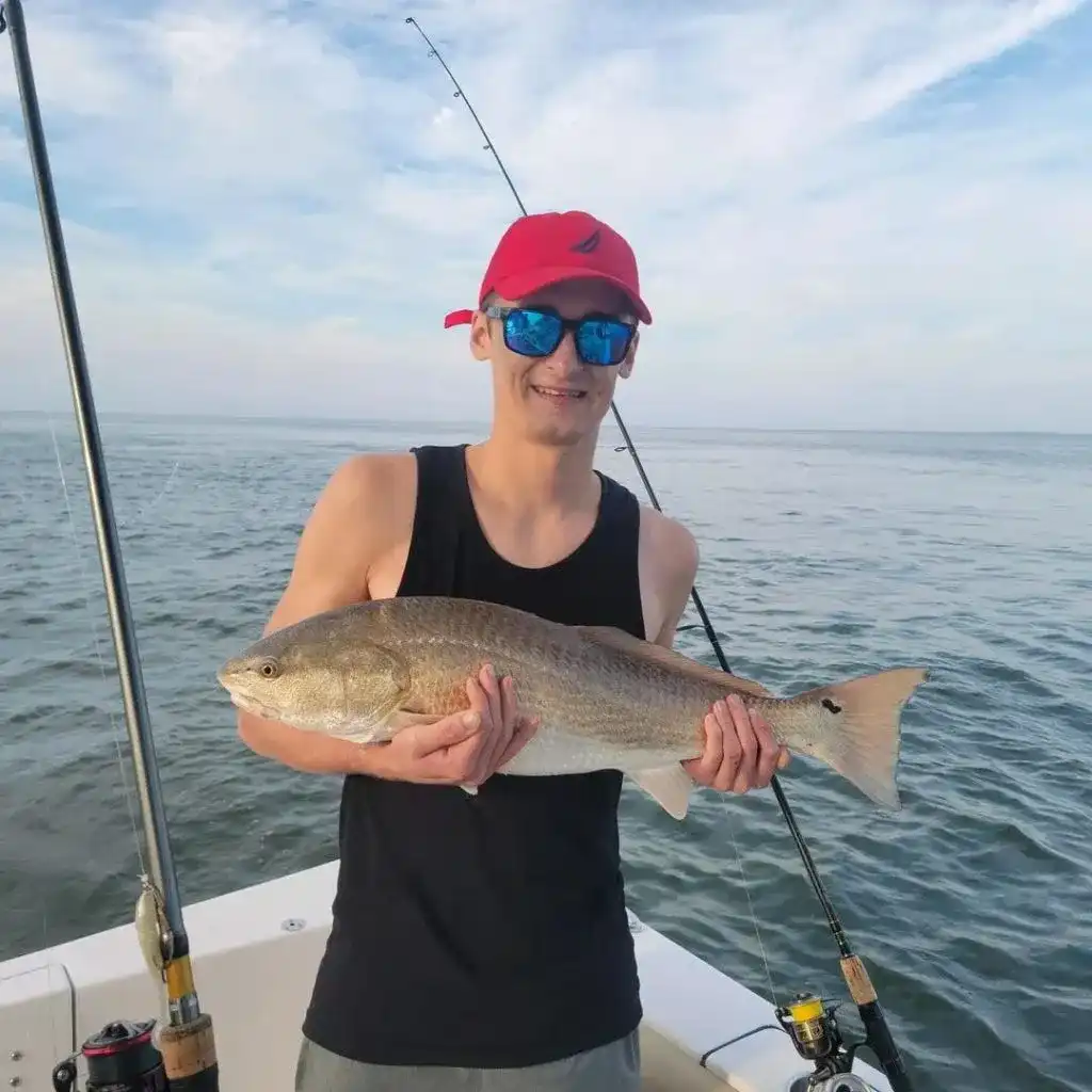 Captain John Speener with a Redfish