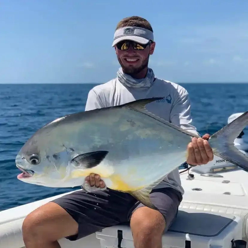 Captain Perry Bedell with a Permit