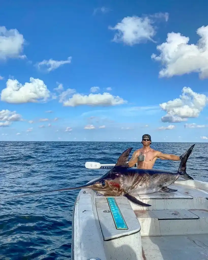 Captain Louis Thornton with a Swordfish