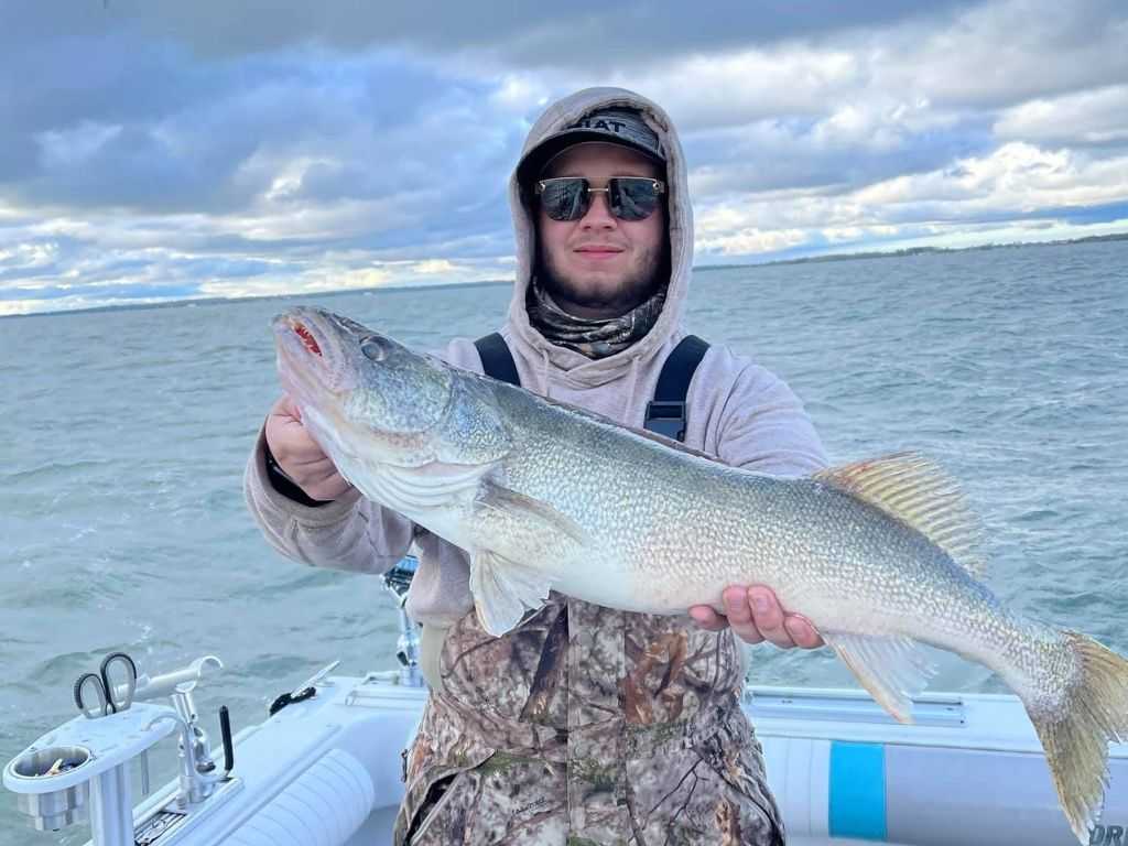 Captain Butch Warden with a Walleye
